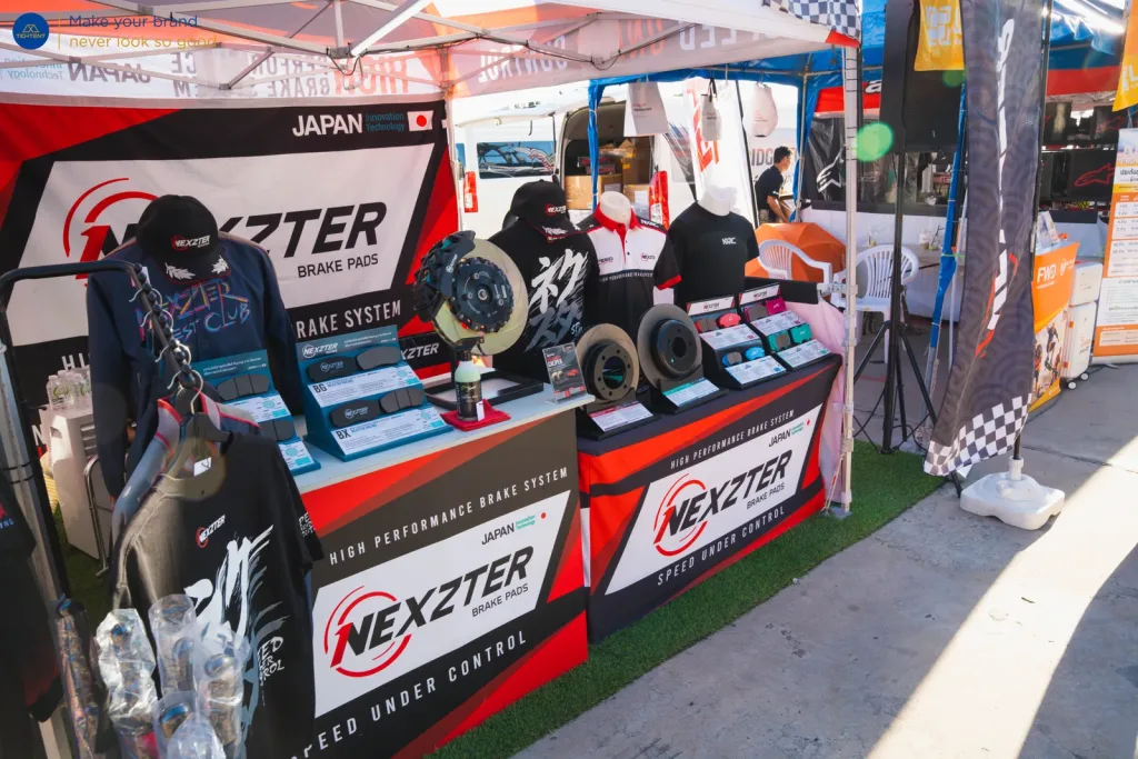 โต๊ะหุ้มผ้าพิมพ์โลโก้ Nexzter จัดแสดงสินค้า