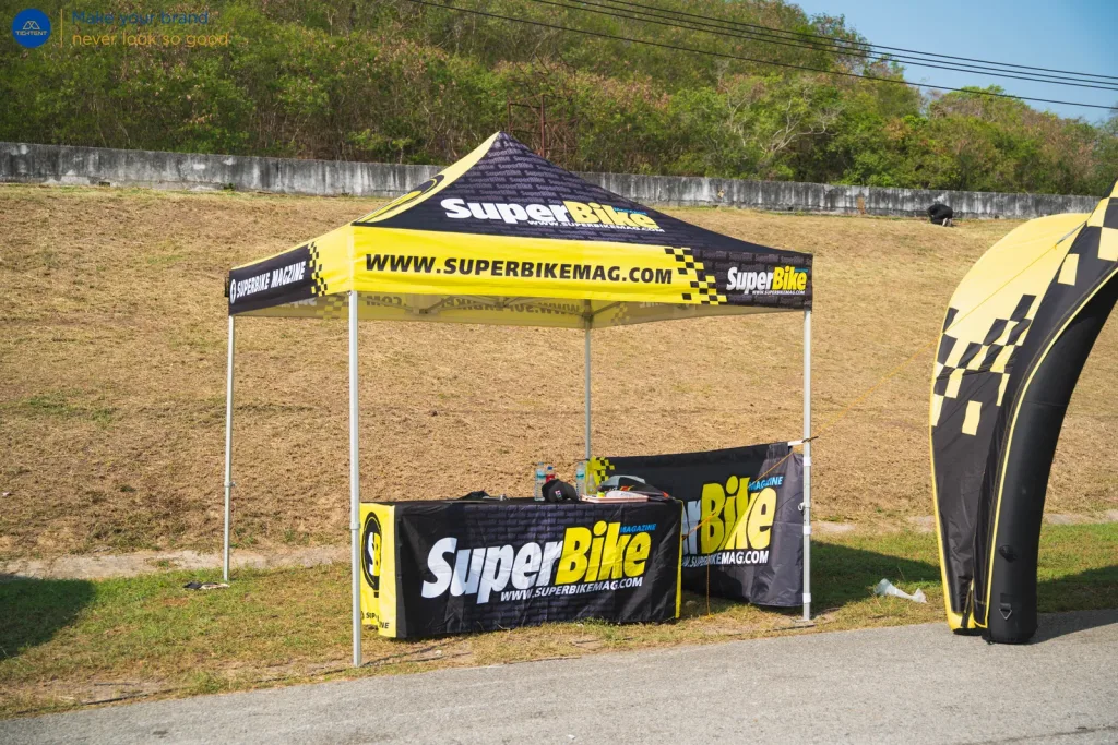 เต็นท์พับ SuperBike พร้อมโต๊ะหุ้มผ้าพิมพ์โลโก้